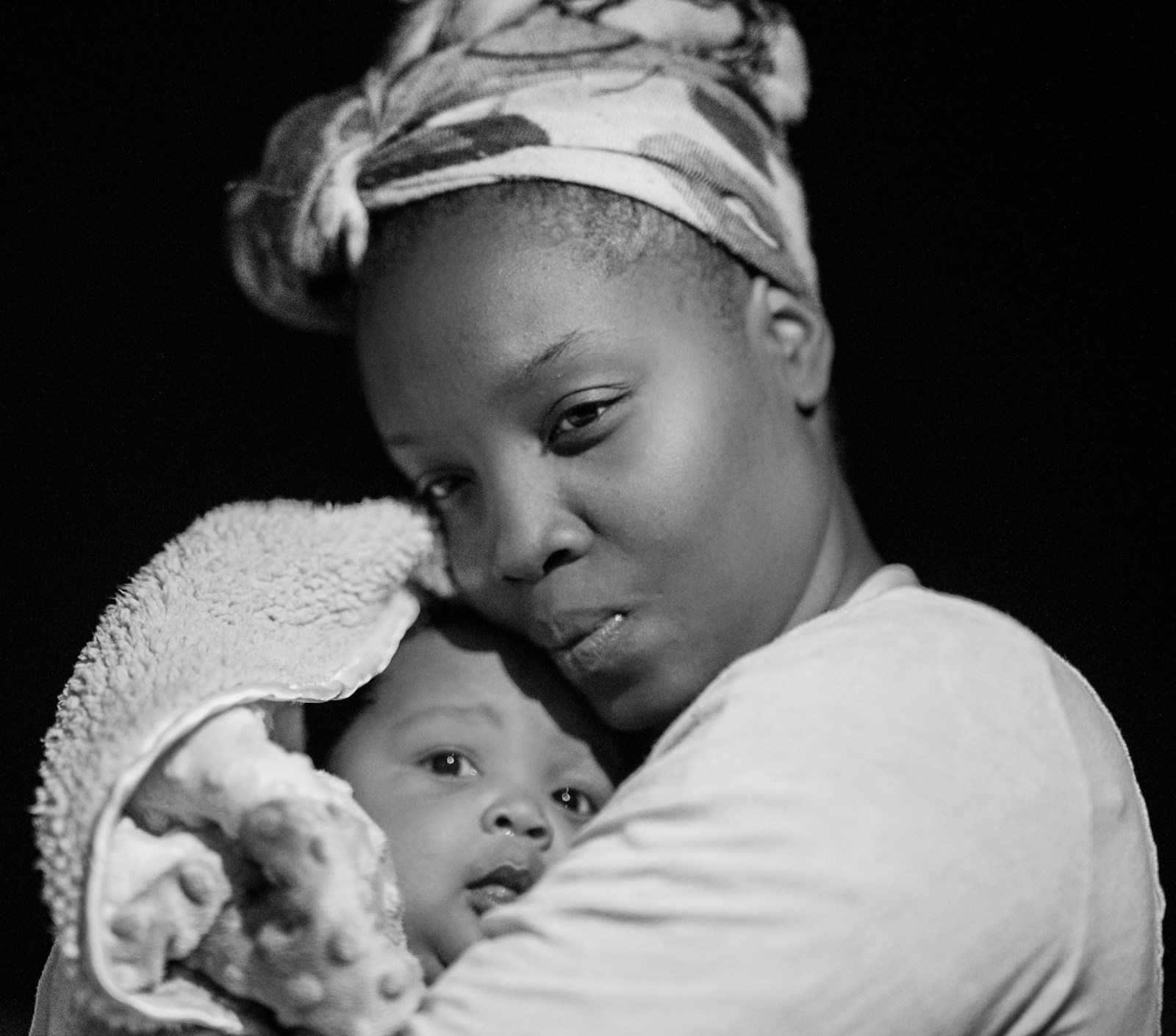 A mother holding her baby