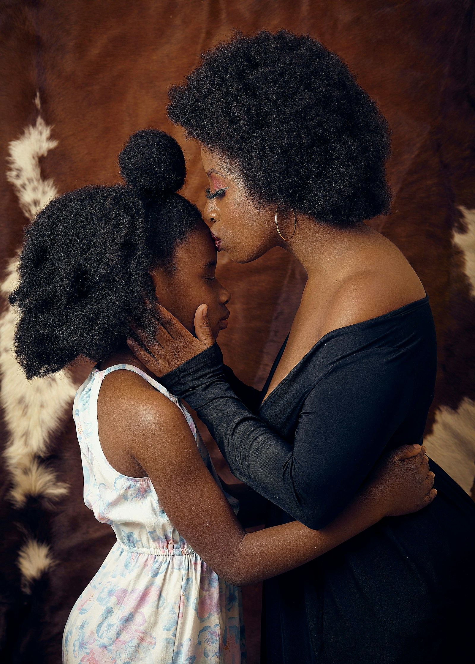 A mother comforting her daughter